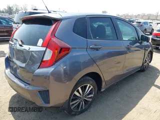 2015 Honda Fit EX-L with VIN 3HGGK5H84FM764084, listed as a IAAI auction lot 42321647 with 82,819 mi miles and . Bid and sale history available at DreamBid. Image 4.