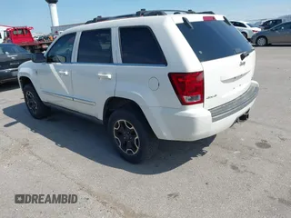 2005 Jeep Grand Cherokee Limited with VIN 1J8HR58245C723778, listed as a IAAI auction lot 42763212 with 127,266 mi miles and . Bid and sale history available at DreamBid. Image 3.