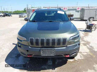 2019 Jeep Cherokee Trailhawk Elite with VIN 1C4PJMBN7KD287506, listed as a IAAI auction lot 42072589 with 108,034 mi miles and . Bid and sale history available at DreamBid. Image 12.