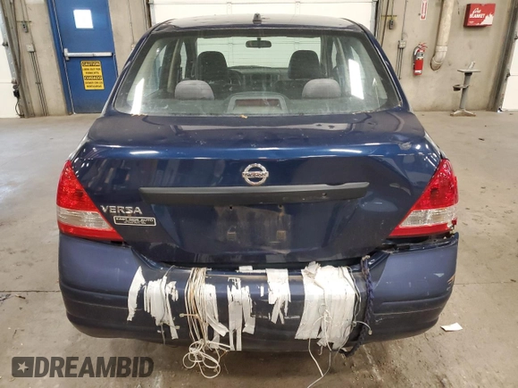 2009 Nissan Versa 1.6 with VIN 3N1CC11E49L458857, listed as a Copart auction lot 59195275 with 100,351 mi miles and Salvage title. Bid and sale history available at DreamBid. Image 6.