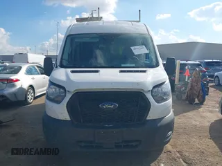 2023 Ford Transit Cargo with VIN 1FTBR1C87PKA63830, listed as a IAAI auction lot 40797669 with 69,162 mi miles and . Bid and sale history available at DreamBid. Image 13.