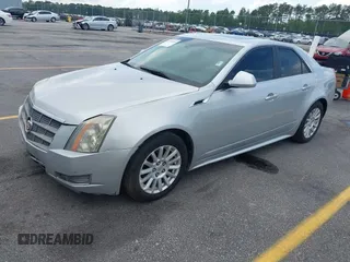 2012 Cadillac CTS Luxury with VIN 1G6DF5E59C0144574, listed as a IAAI auction lot 42116934 with 219,246 mi miles and . Bid and sale history available at DreamBid. Image 2.