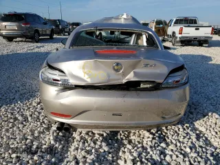 2009 BMW Z4 sDrive30i with VIN WBALM53509E161273, listed as a Copart auction lot 80563954 with 0 mi miles and Salvage Title. Bid and sale history available at carsss.com. Image 6.
