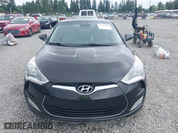 2012 Hyundai Veloster w/Gray Int with VIN KMHTC6AD4CU062034, listed as a IAAI auction lot 42371790 with 116,861 mi miles and . Bid and sale history available at DreamBid. Image 12.