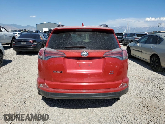 2017 Toyota RAV4 LE with VIN JTMBFREV1HJ134909, listed as a Copart auction lot 60103055 with 71,414 mi miles and Salvage title. Bid and sale history available at DreamBid. Image 6.