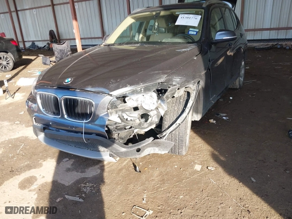 2013 BMW X1 28i with VIN WBAVM1C53DVW43228, listed as a IAAI auction lot 41301776 with 61,323 mi miles. Bid and sale history available at carsss.com. Image 6.