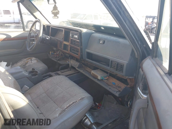 1994 Jeep Cherokee Country z VIN 1J4FJ78S9RL193633, wystawiony jako IAAI lot #42128672 z przebiegiem 231 430 mil mil oraz . Historia ofert i sprzedaży dostępna na DreamBid. Obrazek 5.