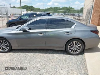 2019 Infiniti Q50 Luxe z VIN JN1EV7APXKM519048, wystawiony jako IAAI lot #42767526 z przebiegiem 99 705 mil mil oraz . Historia ofert i sprzedaży dostępna na DreamBid. Obrazek 14.