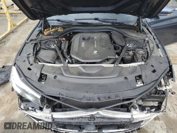 2017 BMW 7 Series 740i xDrive with VIN WBA7E4C32HGU99963, listed as a Copart auction lot 65848354 with 99,396 mi miles and Salvage Title. Bid and sale history available at carsss.com. Image 11.