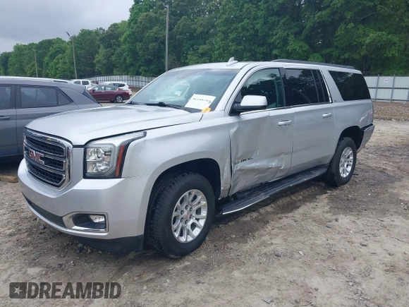 2019 GMC Yukon XL SLT z VIN 1GKS1GKC0KR242408, wystawiony jako IAAI lot #42144783 z przebiegiem Nie podano mil oraz . Historia ofert i sprzedaży dostępna na DreamBid. Obrazek 16.
