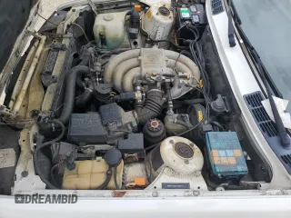 1990 BMW 3 Series z VIN WBABB2319LEC20795, wystawiony jako Copart lot #75079694 z przebiegiem 155 682 mil mil oraz Szkoda całkowita • Salvage title. Historia ofert i sprzedaży dostępna na DreamBid. Obrazek 11.
