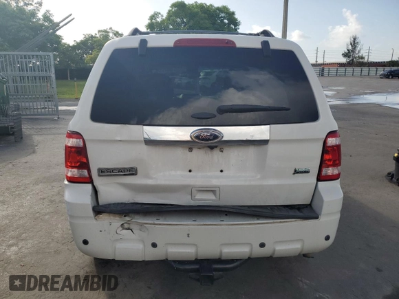 2012 Ford Escape Limited with VIN 1FMCU9EG3CKA34353, listed as a Copart auction lot 60621375 with 199,984 mi miles and Salvage title. Bid and sale history available at DreamBid. Image 6.
