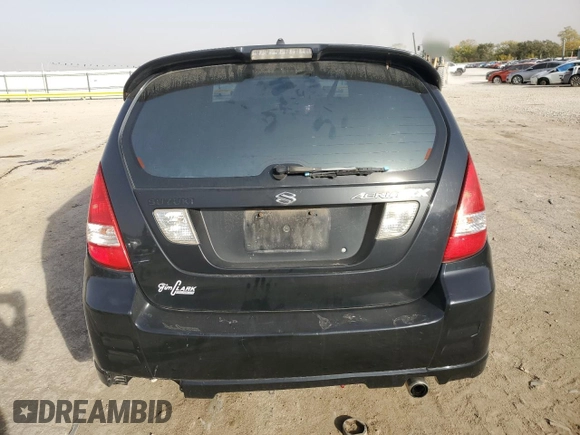 2003 Suzuki Aerio SX z VIN JS2RC41H135205642, wystawiony jako Copart lot #77690224 z przebiegiem 161 414 mil mil oraz Szkoda całkowita • Salvage title. Historia ofert i sprzedaży dostępna na DreamBid. Obrazek 6.