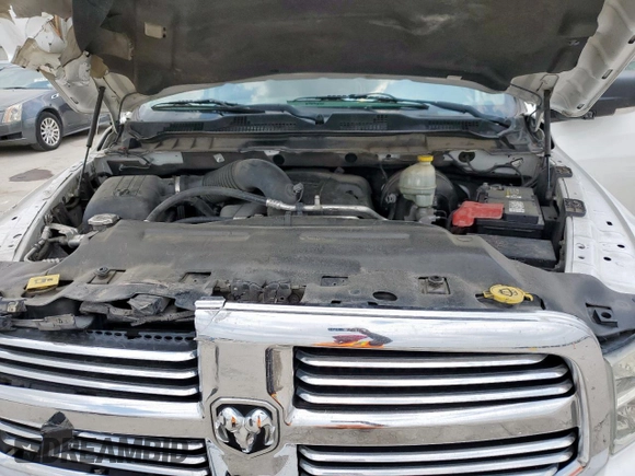 2015 Ram 1500 Outdoorsman with VIN 1C6RR6LT2FS559639, listed as a Copart auction lot 55867495 with 210,216 mi miles and Salvage title. Bid and sale history available at DreamBid. Image 11.