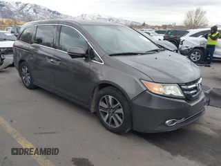2015 Honda Odyssey Touring Elite with VIN 5FNRL5H94FB031342, listed as a IAAI auction lot 41112966 with 153,113 mi miles and . Bid and sale history available at DreamBid. Image 1.
