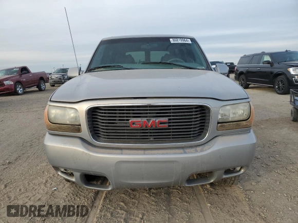 2000 GMC Denali z VIN 1GKEK63R9YR225073, wystawiony jako Copart lot #86819964 z przebiegiem 207 827 mil mil oraz Szkody całkowita. Historia ofert i sprzedaży dostępna na DreamBid. Obrazek 5.
