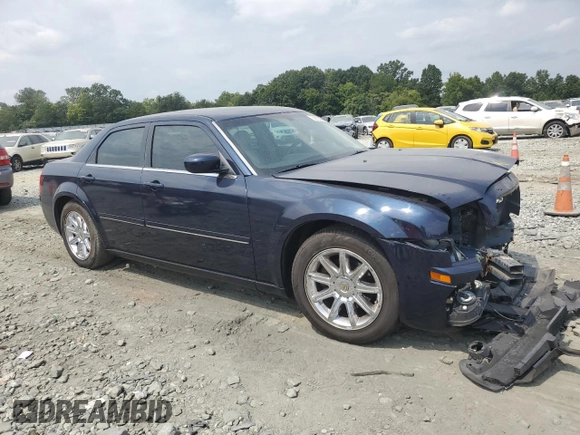 2005 Chrysler 300 with VIN 2C3AA53G05H589338, listed as a Copart auction lot 69333264 with 153,488 mi miles and Salvage Title. Bid and sale history available at carsss.com. Image 4.