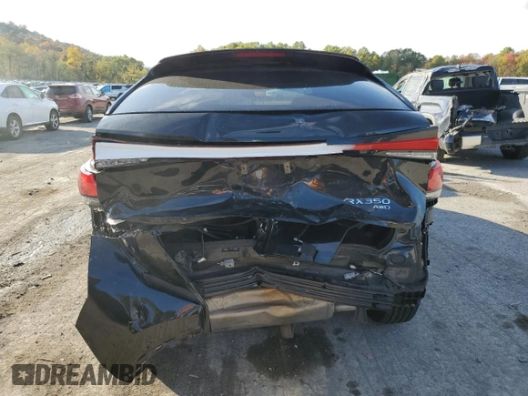 2023 Lexus RX with VIN 2T2BAMCA2PC013409, listed as a Copart auction lot 71721004 with 10,615 mi miles and Salvage Title. Bid and sale history available at carsss.com. Image 6.