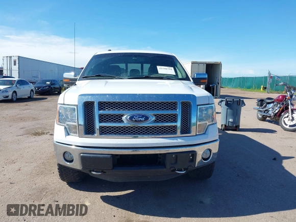 2011 Ford F-150 XLT z VIN 1FTFW1ET2BFC65701, wystawiony jako IAAI lot #42598794 z przebiegiem 209 676 mil mil oraz . Historia ofert i sprzedaży dostępna na DreamBid. Obrazek 12.