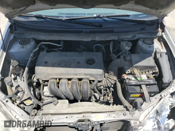2006 Toyota Corolla CE z VIN 1NXBR32E06Z673649, wystawiony jako Copart lot #56927735 z przebiegiem 299 999 mil mil oraz Szkoda całkowita • Salvage title. Historia ofert i sprzedaży dostępna na DreamBid. Obrazek 11.