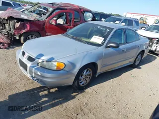 2004 Pontiac Grand Am SE with VIN 1G2NE52F74M684408, listed as a IAAI auction lot 39194361 with 169,247 mi miles. Bid and sale history available at carsss.com. Image 2.