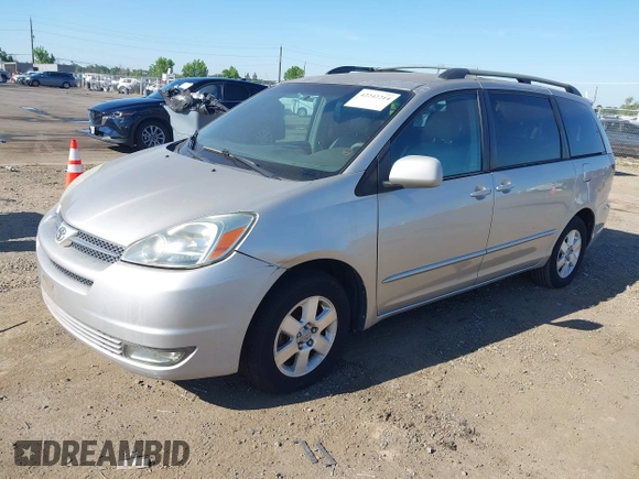2004 Toyota Sienna XLE with VIN 5TDZA22C14S210679, listed as a IAAI auction lot 42242214 with 148,178 mi miles and . Bid and sale history available at DreamBid. Image 2.