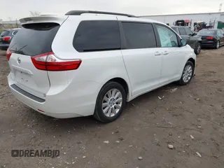 2016 Toyota Sienna Ltd with VIN 5TDDK3DC3GS129715, listed as a IAAI auction lot 40849430 with 138,724 mi miles. Bid and sale history available at carsss.com. Image 4.