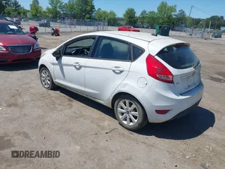 2013 Ford Fiesta SE with VIN 3FADP4EJ0DM109816, listed as a IAAI auction lot 42119360 with 164,397 mi miles and . Bid and sale history available at DreamBid. Image 3.
