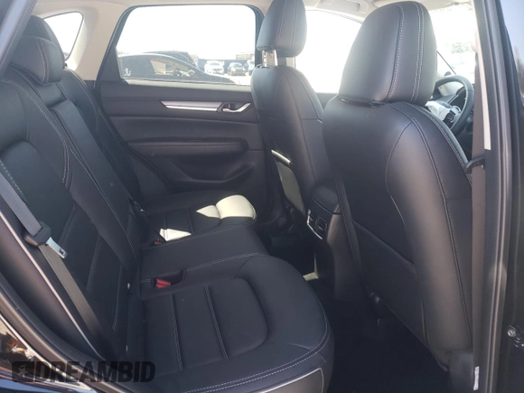2025 Mazda CX-5 2.5 S Premium Plus Package with VIN JM3KFBEM6S0546892, listed as a Copart auction lot 49217495 with 1,144 mi miles and Salvage Title. Bid and sale history available at carsss.com. Image 12.