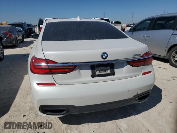 2019 BMW 7 Series 750i with VIN WBA7F0C5XKGM25348, listed as a Copart auction lot 46537485 with 54,365 mi miles and Salvage title. Bid and sale history available at DreamBid. Image 6.