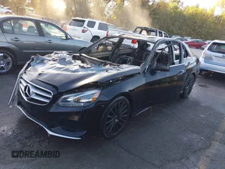 2014 Mercedes-Benz E 550 Sport with VIN WDDHF9BB0EA820235, listed as a IAAI auction lot 40606923 with Not Provided miles and . Bid and sale history available at DreamBid. Image 2.