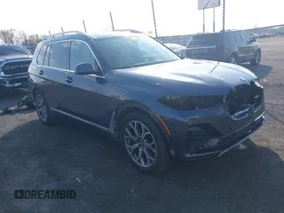 2021 BMW X7 xDrive40i with VIN 5UXCW2C06M9H03043, listed as a IAAI auction lot 41553664 with 66,554 mi miles. Bid and sale history available at carsss.com. Image 1.