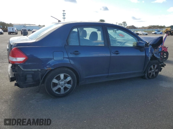 2009 Nissan Versa 1.8 S with VIN 3N1BC11E69L441683, listed as a Copart auction lot 43377925 with 111,958 mi miles and Salvage Title. Bid and sale history available at carsss.com. Image 3.