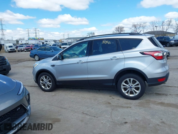 2017 Ford Escape SE with VIN 1FMCU0GD3HUD25445, listed as a IAAI auction lot 42043186 with 90,618 mi miles. Bid and sale history available at carsss.com. Image 14.