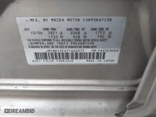 2007 Mazda Mazda3 i Sport with VIN JM1BK12FX71660075, listed as a IAAI auction lot 41923092 with 130,064 mi miles. Bid and sale history available at carsss.com. Image 9.