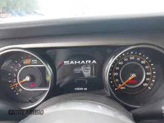 2019 Jeep Wrangler Unlimited Sahara with VIN 1C4HJXEN2KW558851, listed as a IAAI auction lot 42205584 with 175,701 mi miles and . Bid and sale history available at DreamBid. Image 7.