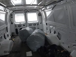2014 Ford Econoline Cargo Commercial with VIN 1FTSS3EL3EDA46848, listed as a IAAI auction lot 41259625 with 106,293 mi miles and . Bid and sale history available at DreamBid. Image 8.