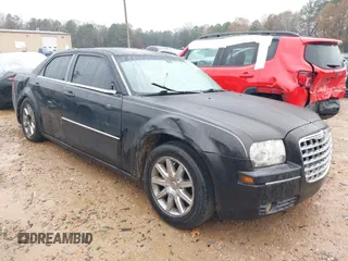 2009 Chrysler 300 Touring with VIN 2C3LA53V69H556955, listed as a IAAI auction lot 41041967 with 1 mi miles. Bid and sale history available at carsss.com. Image 1.