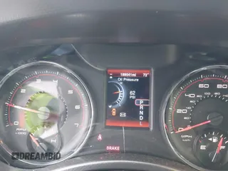 2014 Dodge Charger SXT with VIN 2C3CDXHG8EH117439, listed as a IAAI auction lot 41458304 with 189,041 mi miles and . Bid and sale history available at DreamBid. Image 16.