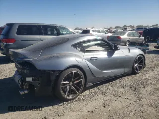 2022 Toyota GR Supra 3.0 with VIN WZ1DB0C01NW048328, listed as a Copart auction lot 75040374 with 0 mi miles and Salvage Title. Bid and sale history available at carsss.com. Image 3.