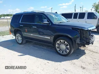 2017 Cadillac Escalade Platinum z VIN 1GYS4DKJ2HR232434, wystawiony jako IAAI lot #41870447 z przebiegiem 89 003 mil mil oraz . Historia ofert i sprzedaży dostępna na DreamBid. Obrazek 1.
