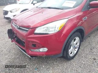 2013 Ford Escape SE with VIN 1FMCU0GXXDUB14120, listed as a IAAI auction lot 42060145 with 171,758 mi miles. Bid and sale history available at carsss.com. Image 17.