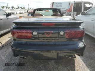 2001 Pontiac Firebird Trans Am z VIN 2G2FV32G812134704, wystawiony jako Copart lot #74893594 z przebiegiem Nie podano mil oraz Nie do naprawy • Non repairable. Historia ofert i sprzedaży dostępna na DreamBid. Obrazek 6.