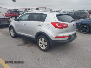 2012 Kia Sportage LX with VIN KNDPBCA24C7214432, listed as a IAAI auction lot 42530116 with 127,623 mi miles and . Bid and sale history available at DreamBid. Image 3.