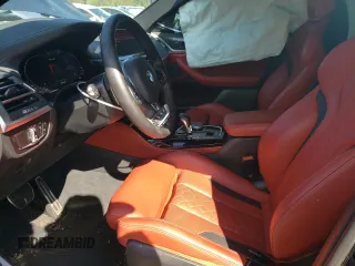 2022 BMW X4 M z VIN 5YM23EC04N9N34444, wystawiony jako Copart lot #65445883 z przebiegiem 7632 mil mil oraz . Historia ofert i sprzedaży dostępna na DreamBid. Obrazek 7.