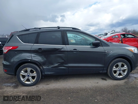 2016 Ford Escape SE with VIN 1FMCU9G92GUC22029, listed as a IAAI auction lot 42032478 with 133,853 mi miles. Bid and sale history available at carsss.com. Image 6.