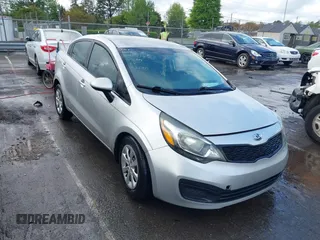 2014 Kia Rio LX with VIN KNADM4A31E6413780, listed as a IAAI auction lot 41996928 with 93,446 mi miles and . Bid and sale history available at DreamBid. Image 1.
