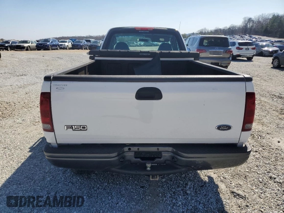 2003 Ford F-150 XL with VIN 2FTRF17WX3CB10461, listed as a Copart auction lot 48663195 with 94,954 mi miles and Salvage Title. Bid and sale history available at DreamBid. Image 6.