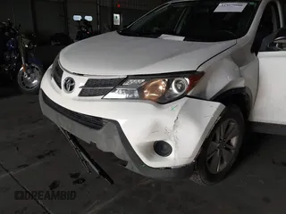 2014 Toyota RAV4 LE with VIN JTMBFREV8EJ005559, listed as a IAAI auction lot 41963080 with 126,296 mi miles and . Bid and sale history available at DreamBid. Image 6.