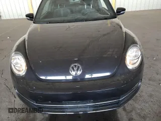 2012 Volkswagen Beetle 2.0T Turbo PZEV with VIN 3VW4A7AT3CM621473, listed as a Copart auction lot 47643595 with 32,840 mi miles and Salvage Title. Bid and sale history available at carsss.com. Image 13.
